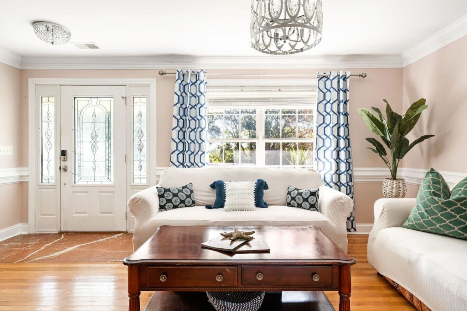 Bright front living room with coastal decor and natural light